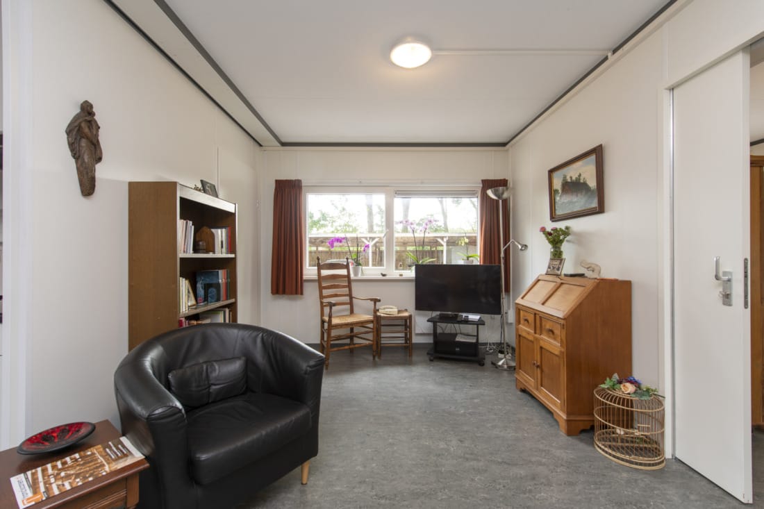 Inrichting van woonkamer in mantelzorgwoning