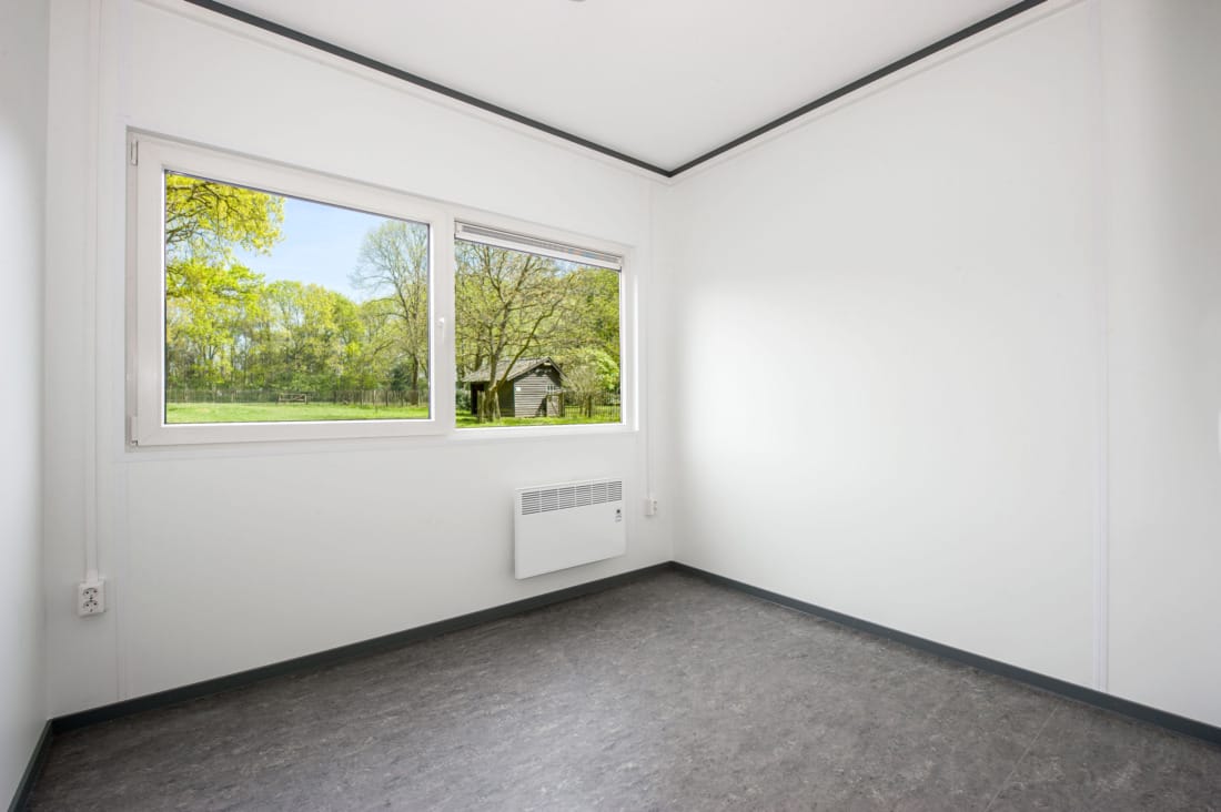 Ruime slaapkamer in tijdelijke woning