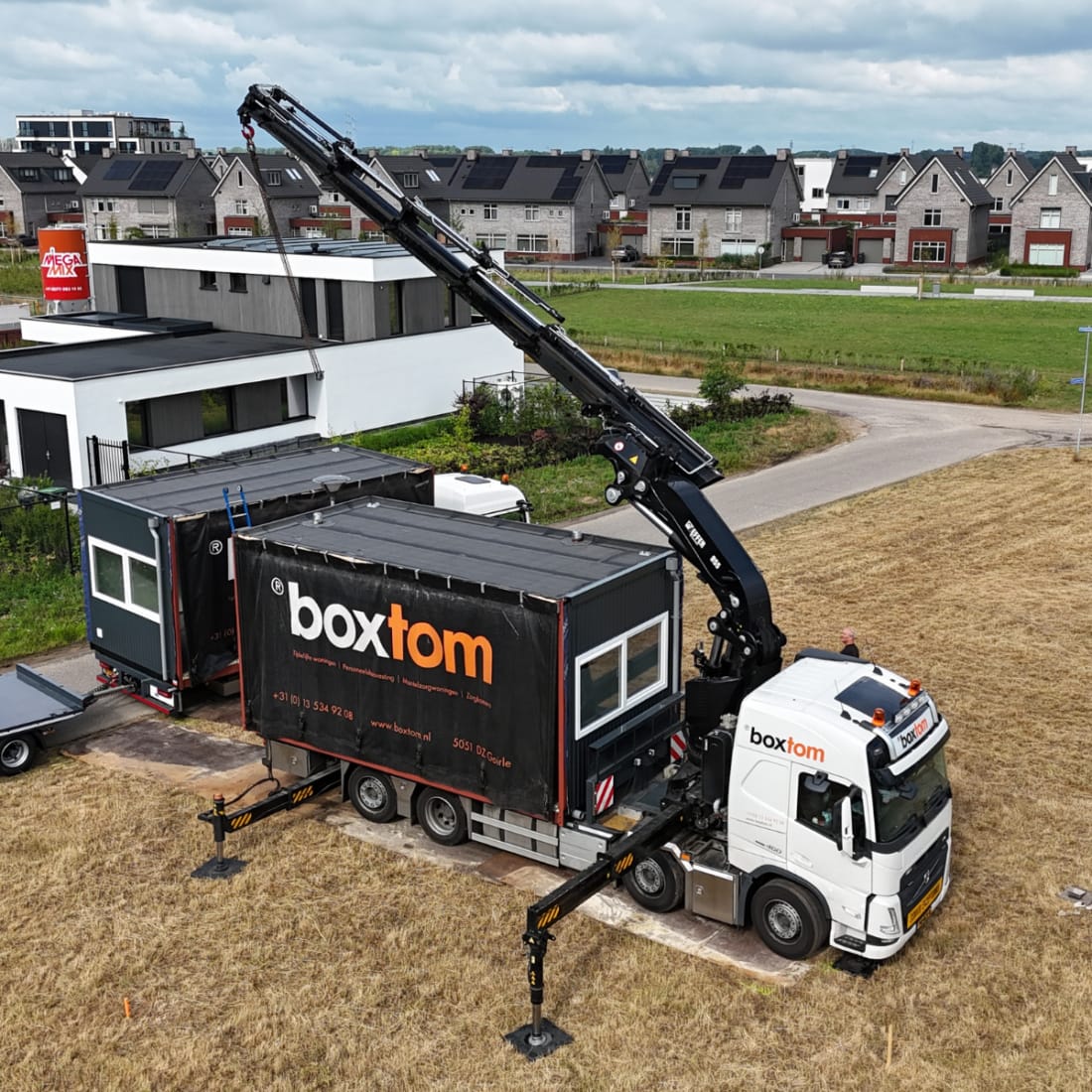 Plaatsen van de woning door Boxtom hijskraan