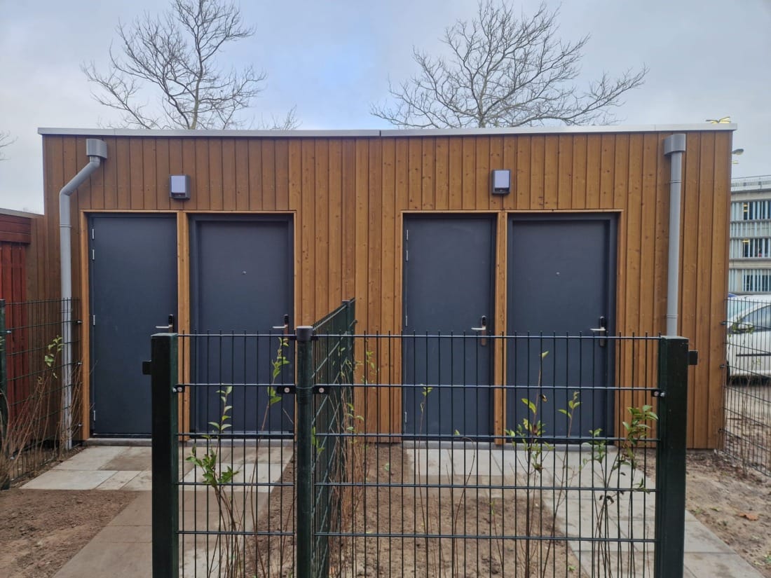 Skaeve Huse woning met houten gevelafwerking op maat gemaakt.