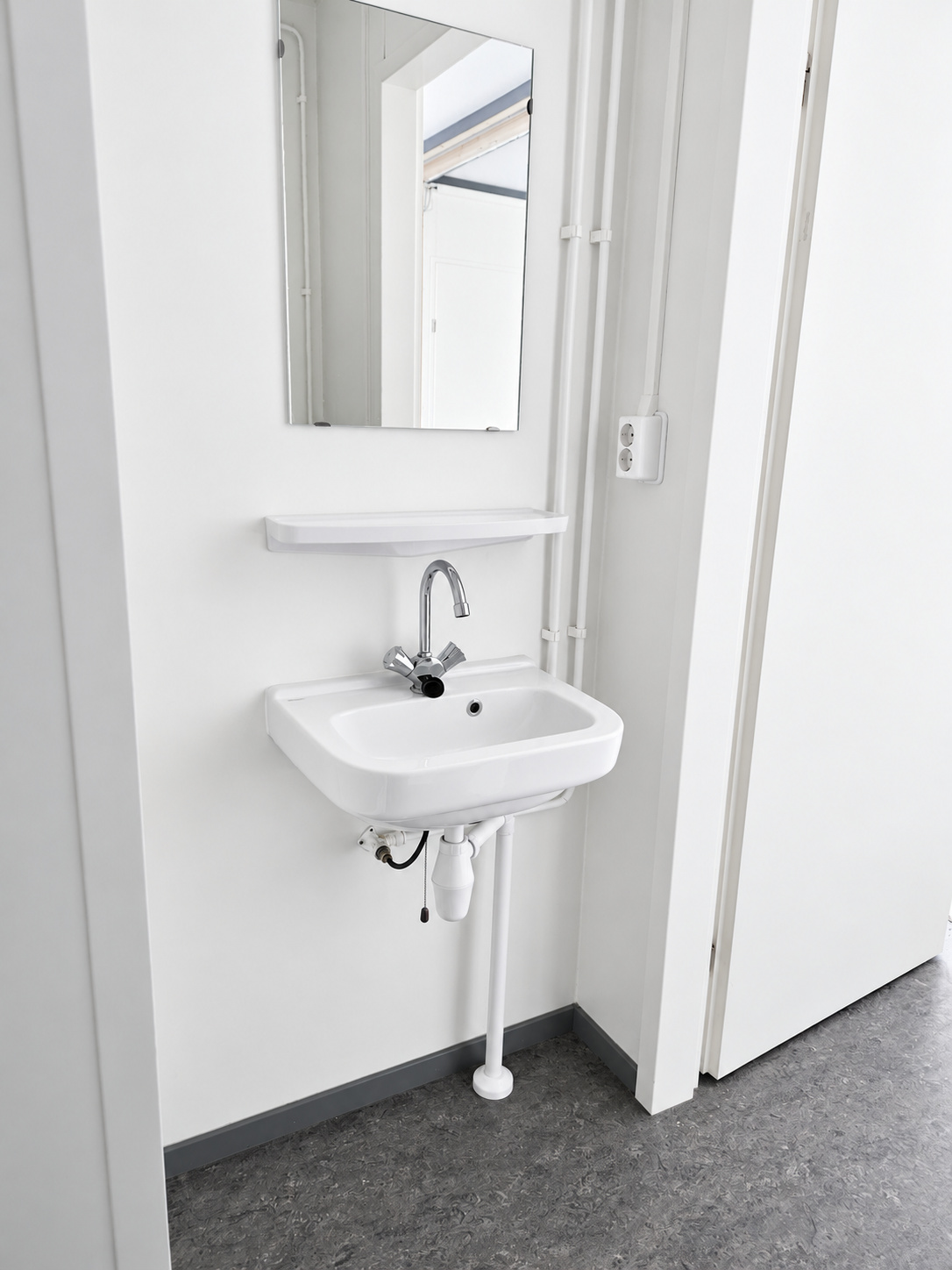 Wasbak in de badkamer van woningtype A1, A2, A3 en B1.