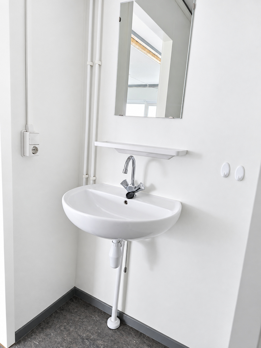 Wasbak in badkamer van woningtype B2, B3, C2, C3 en D.